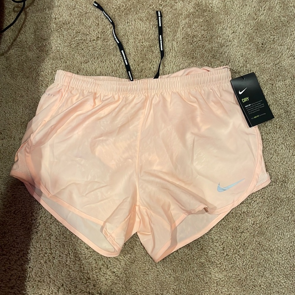 pink Nike running shorts